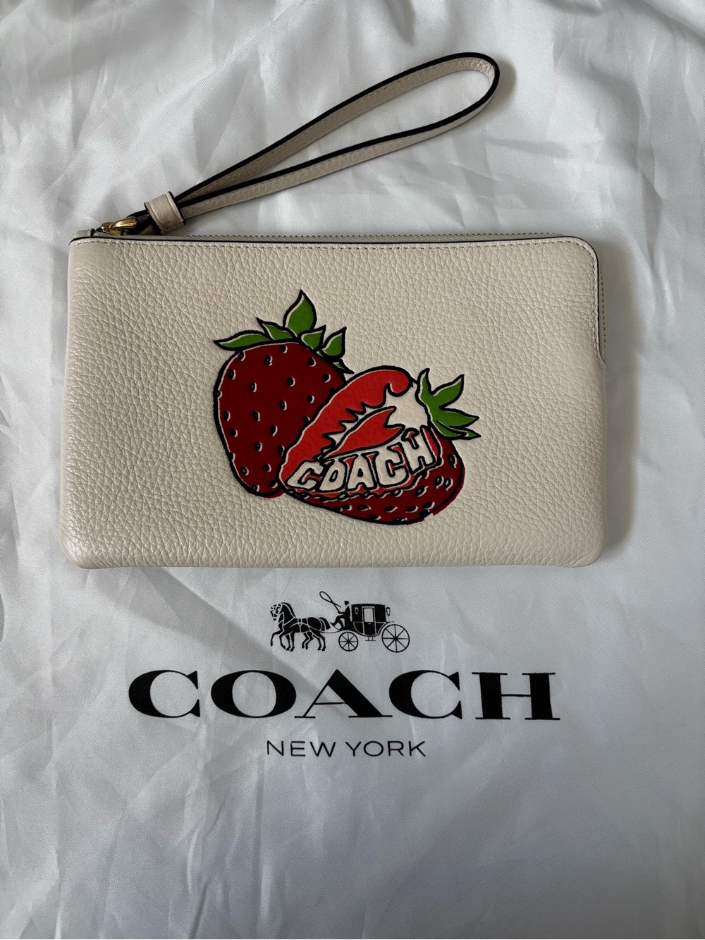 COACH Cream Leather Wristlet with Red Strawberry Graphic